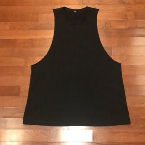 Three means sleeveless muscle workout shirts.   Great condition.